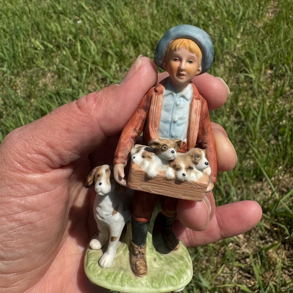 Norman Rockwell Puppy Love Figurine of Boy with Puppies